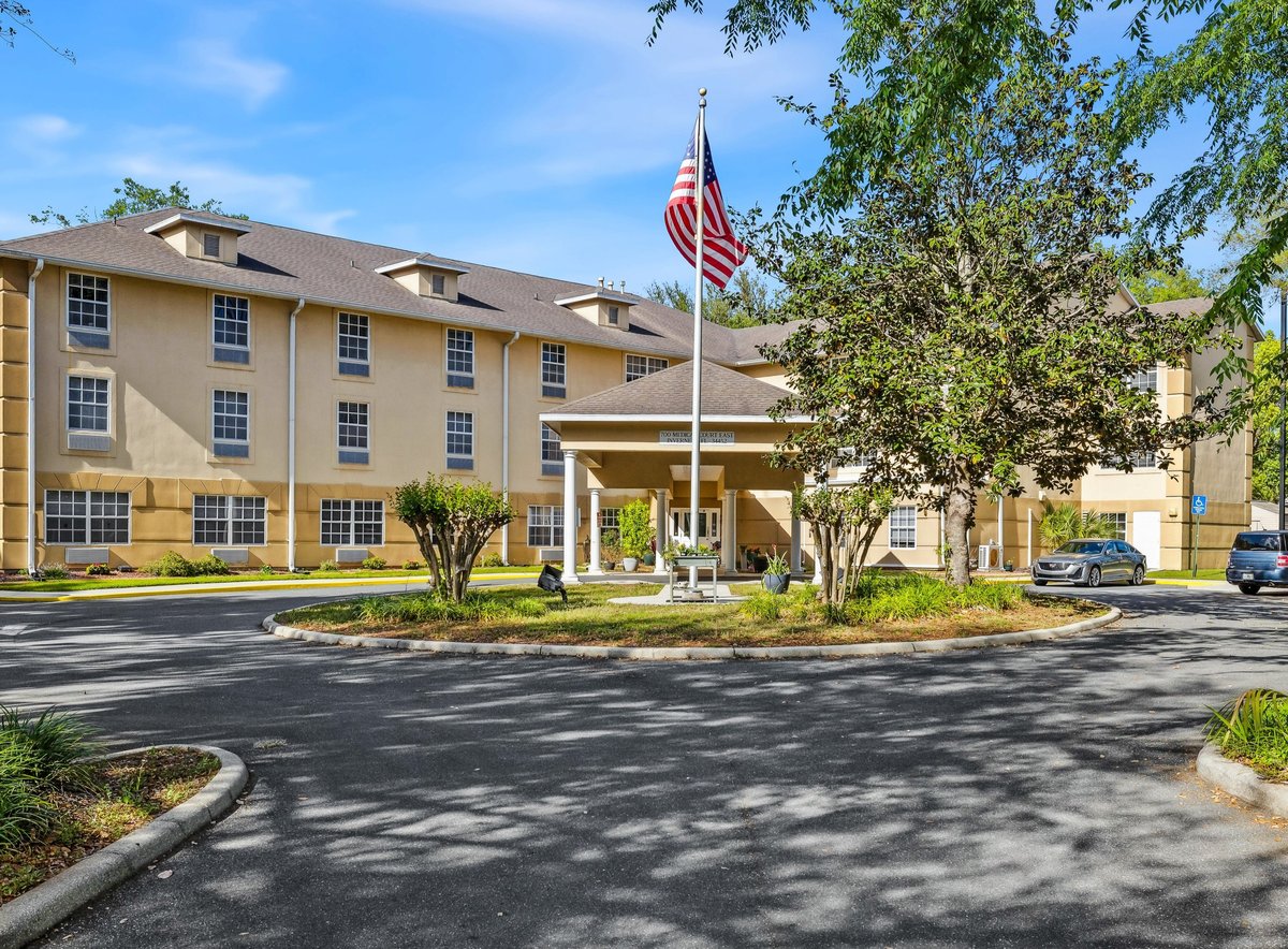 Highland Place front entrance with US flag
