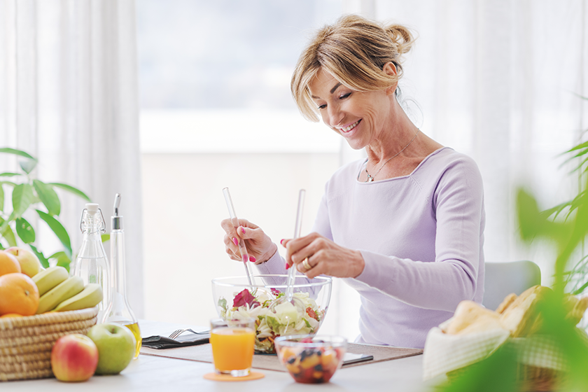 beautiful-mature-woman-having-healthy-lunch