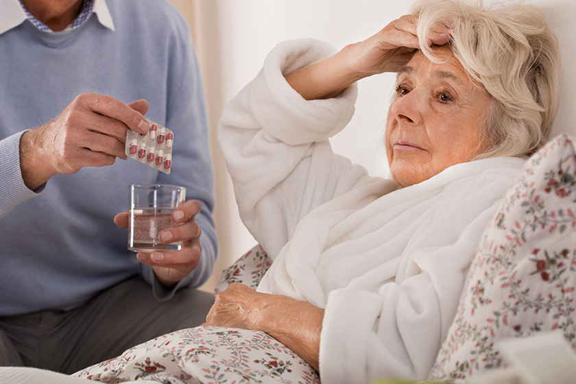 Ill woman staying in bed 