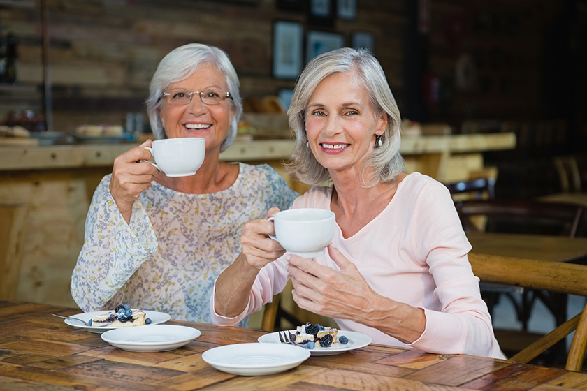 senior-friends-having-coffee-and-breakfast